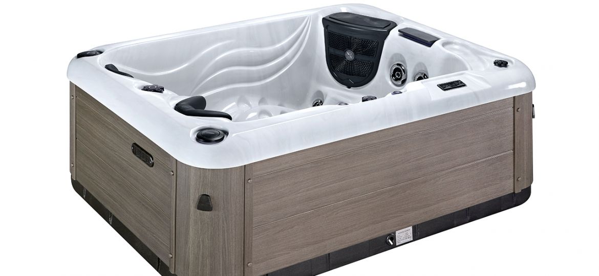 Cosy up in Favells Titus Plug&Play hot tub for an