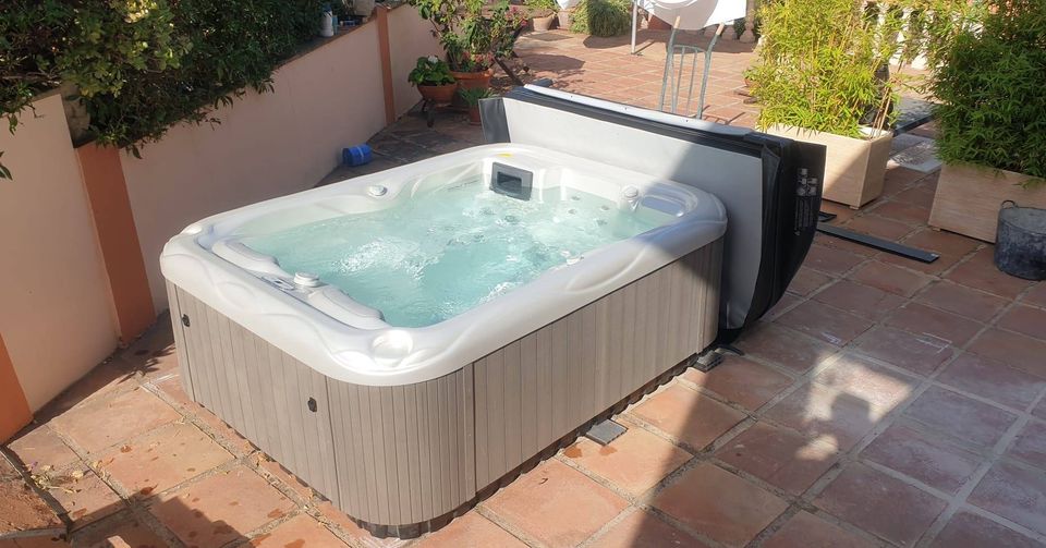 This charming Mars hot tub was delivered and installed for